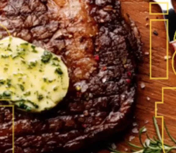Costata alla piastra con burro aromatizzato al rosmarino